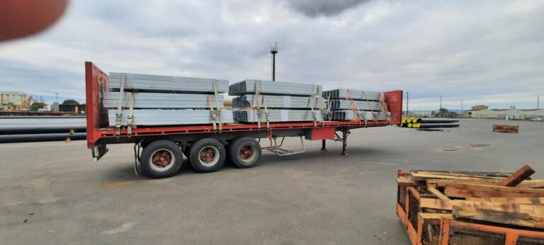 Aerial view of large scale solar farm logistics